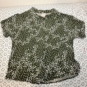 A button down green flower shirt.